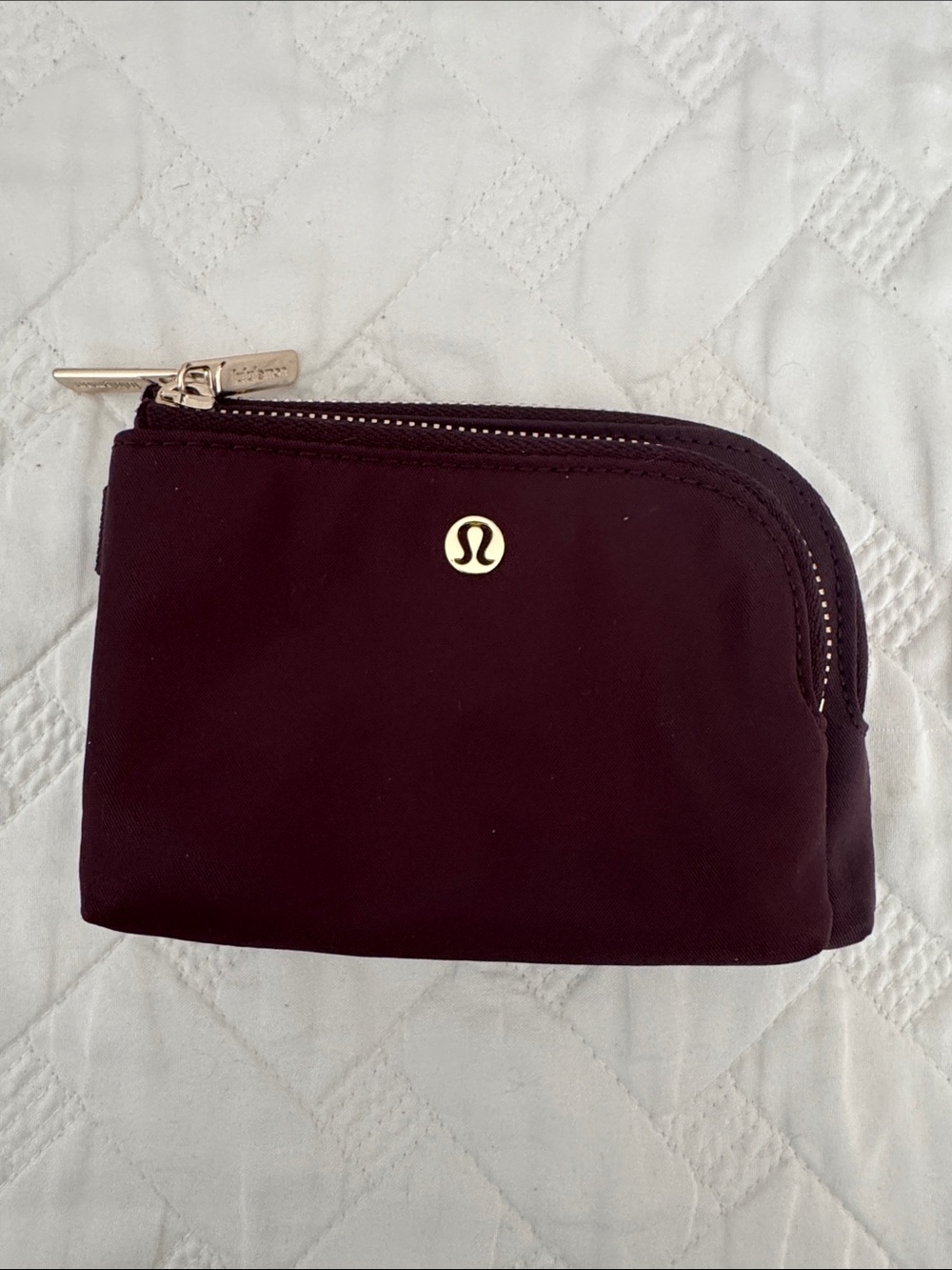 lululemon athletica burgundy key & card holder with gold logo